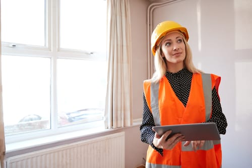 female surveyor wearing hard hat